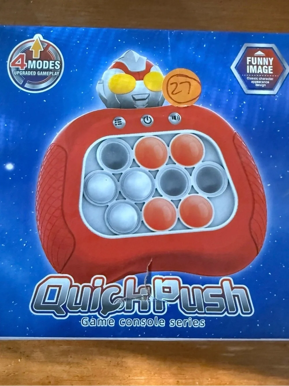 Red Handheld Game Console - Compact Pop-Button Gameplay